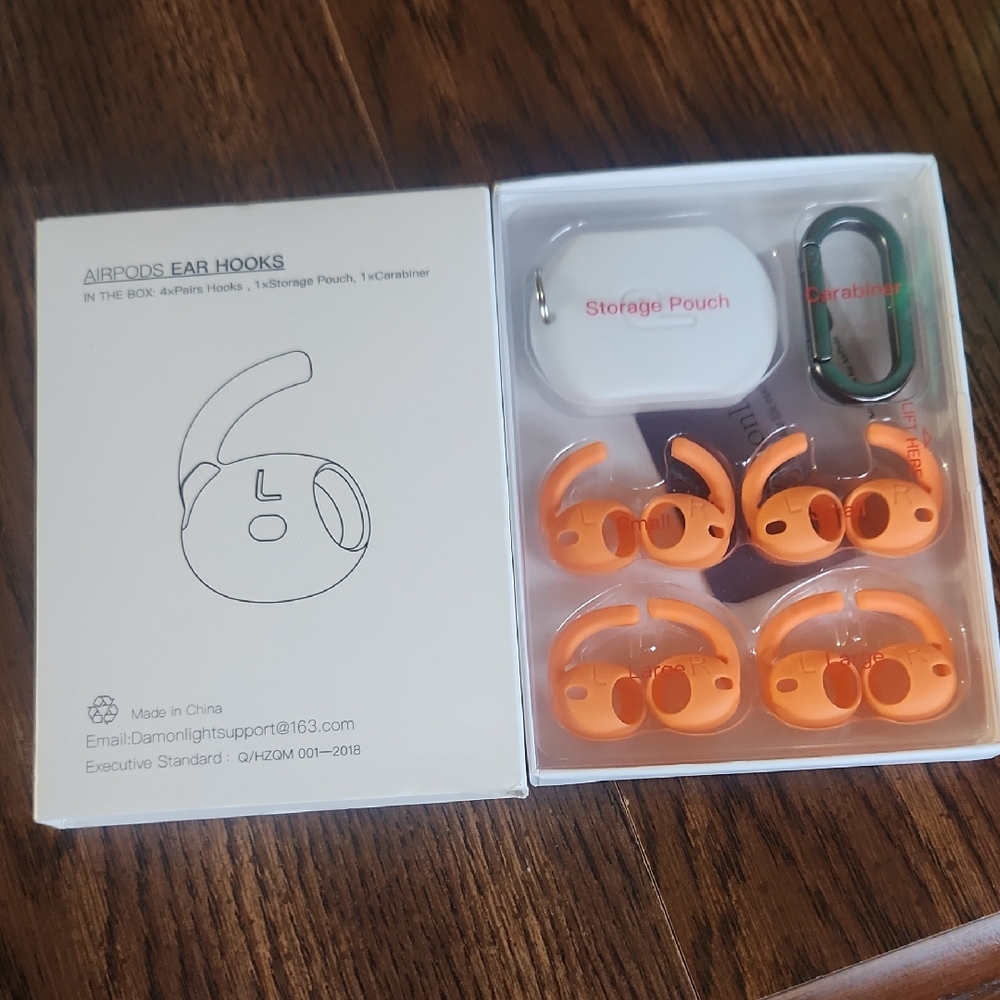 NIB Orange AirPods Ear Hooks with Storage Pouch
